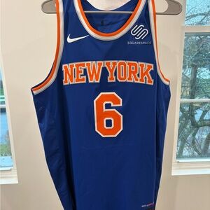 Nike Blue and Orange Knicks Porzingis New York Jersey